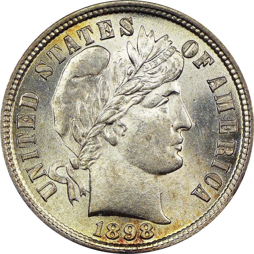 Obverse die chip on 1898 Barber dime near Liberty's chin showing raised metal caused by a die defect